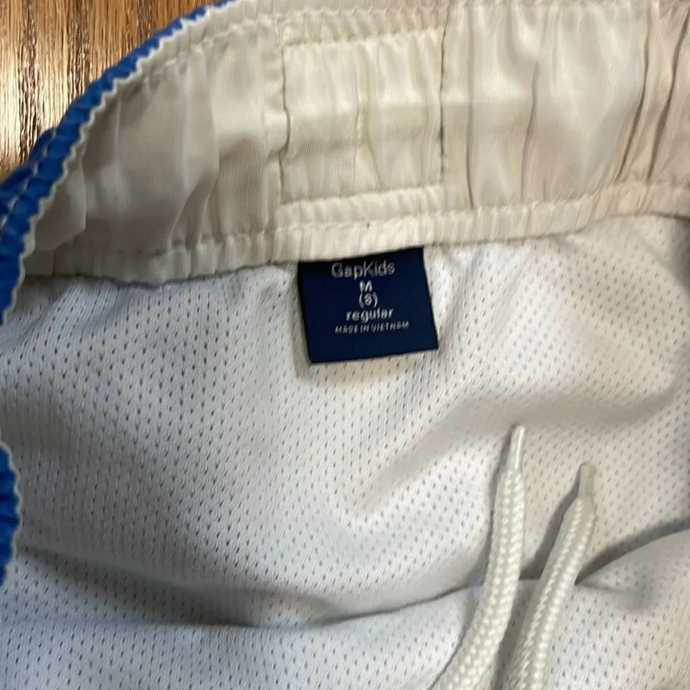 Gap kids swimming shorts.  Drawstring waist waist. Size  medium. Size 8.